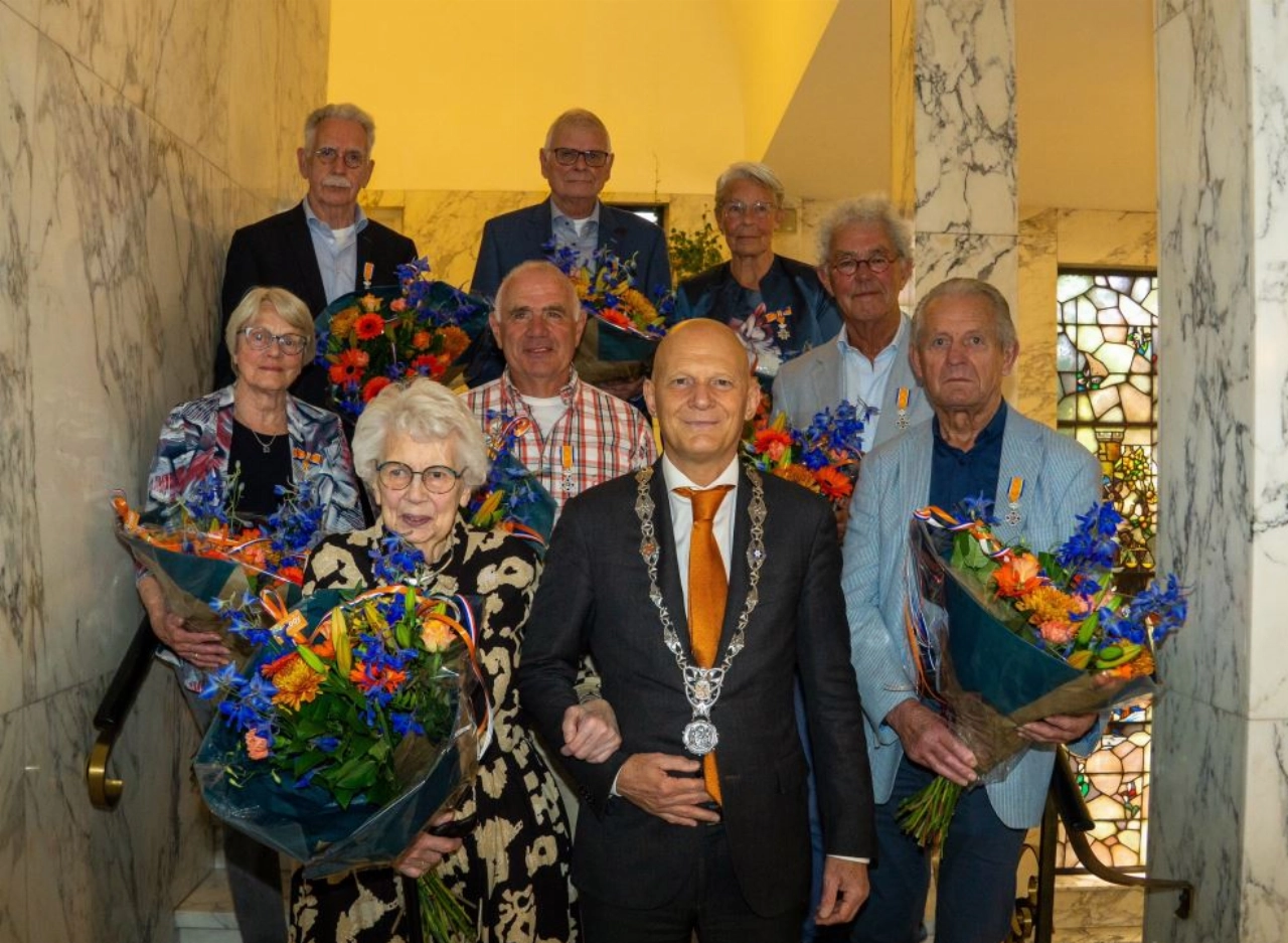 Penningmeester Groene Luiken ontvangt lintje